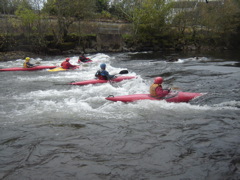 Playing on a wave1.JPG